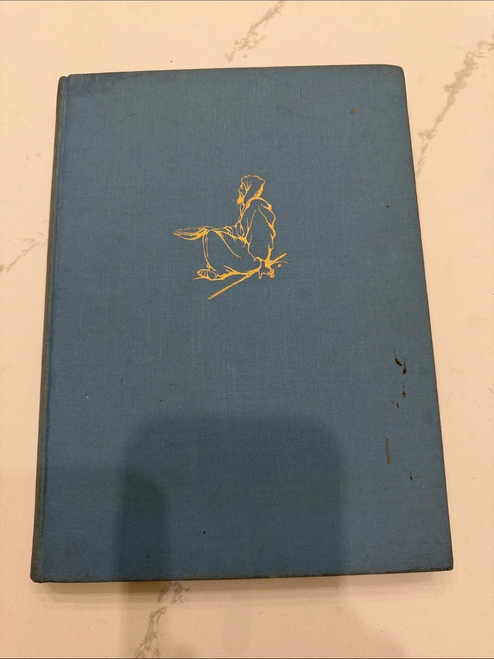Dutch Blue Hardcover Book with Gold Fisherman Illustration